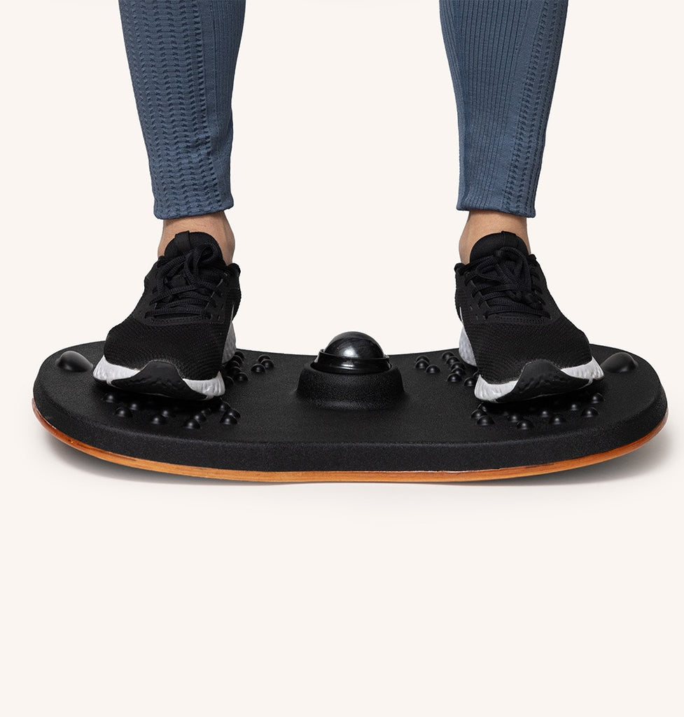 Balance board with shoes