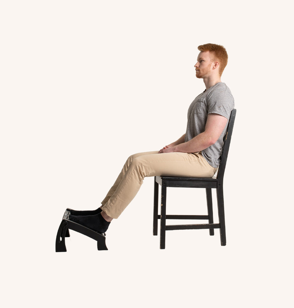 footrest ergonomic sitting in a chair